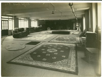 Showroom for Anglo-Turkey weaves, Carpet Trades, 1923 by English Photographer